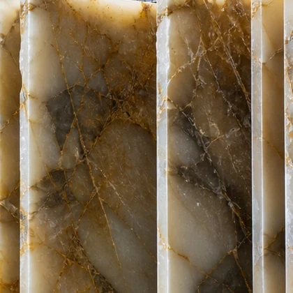 Translucent honey-white slabs with golden veins glowing under light